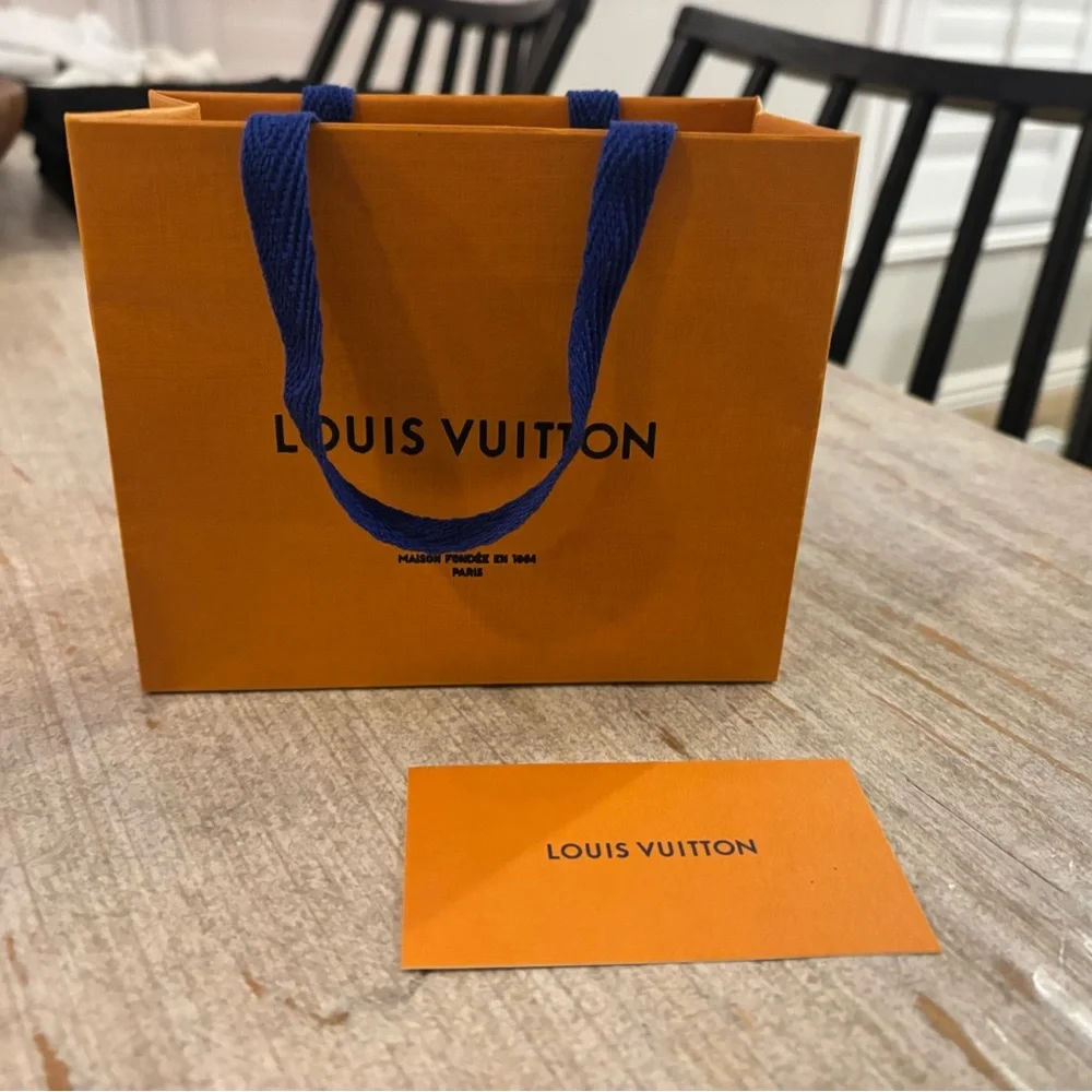 Louis Vuitton Vibrant Orange Bag with Blue Handles